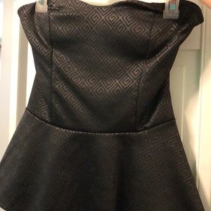 Strapless peplum black top